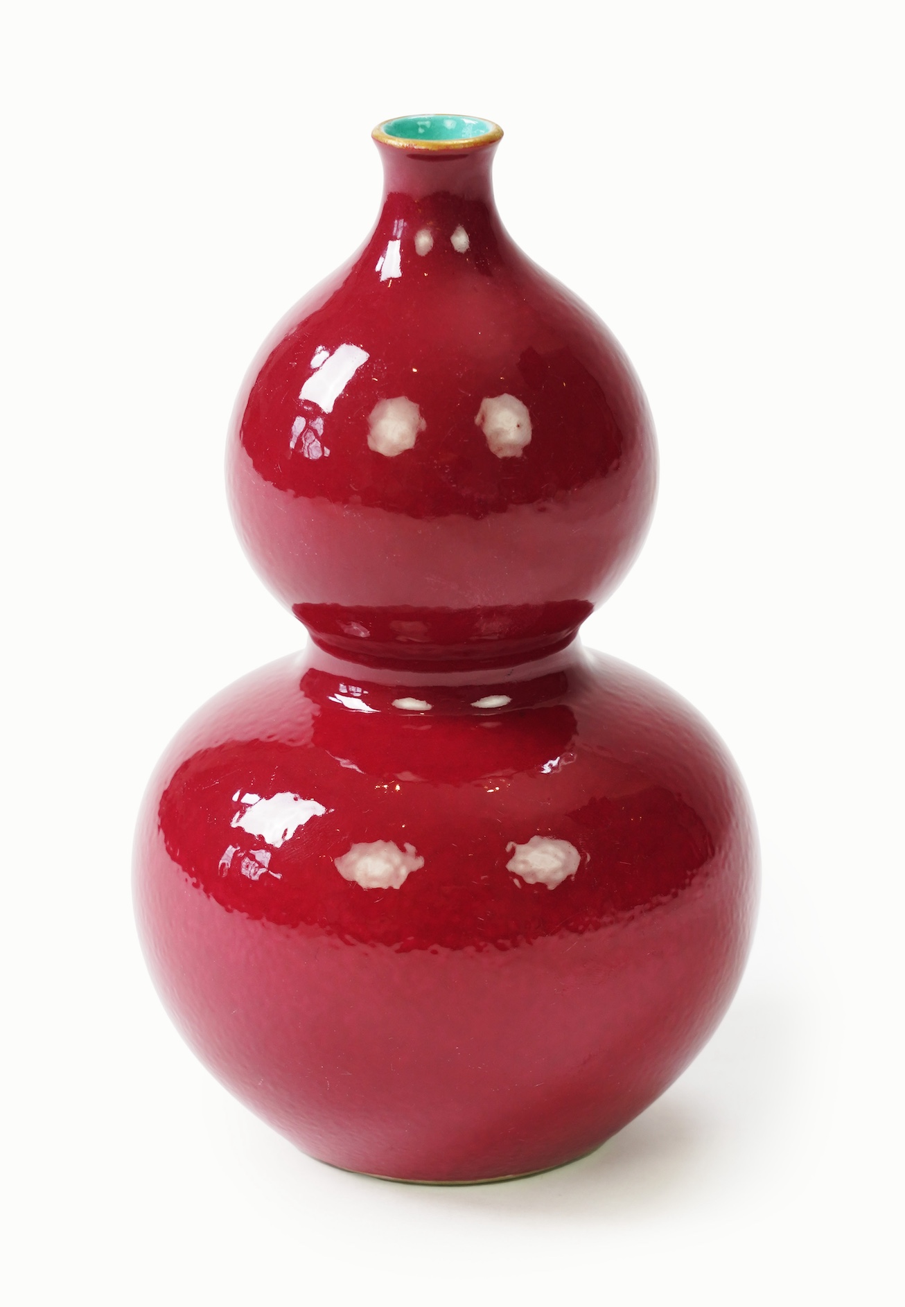 A Chinese ruby ground double gourd vase, Qianlong seal mark but later